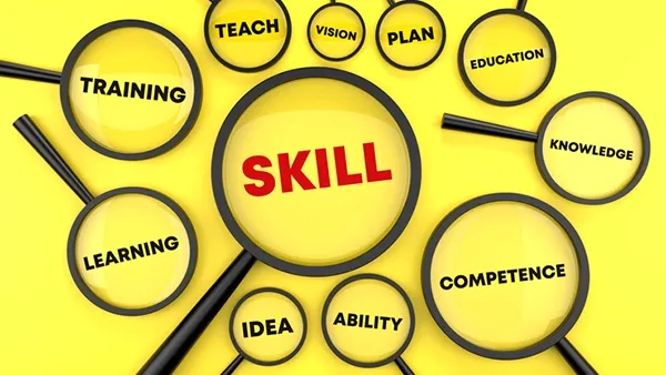 Illustration of multiple magnifying glasses on a bright yellow background, with the largest lens highlighting the word “SKILL.” Surrounding lenses contain the words “TRAINING,” “LEARNING,” “TEACH,” “VISION,” “PLAN,” “EDUCATION,” “KNOWLEDGE,” “COMPETENCE,” “ABILITY,” and “IDEA,” emphasizing workforce development, education, and professional skills.